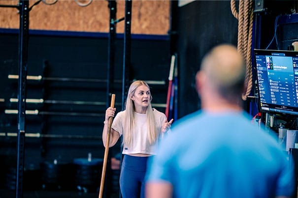 Trainer explaining on personal training